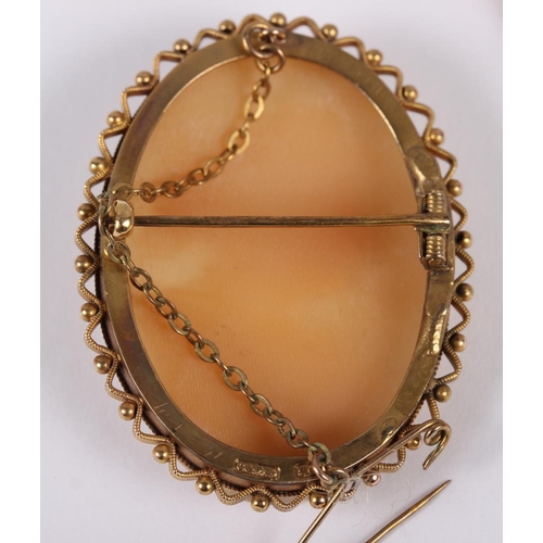 347 - A carved shell cameo brooch with 9ct gold mount, a smaller similar and a Georgian yellow metal mourn... 