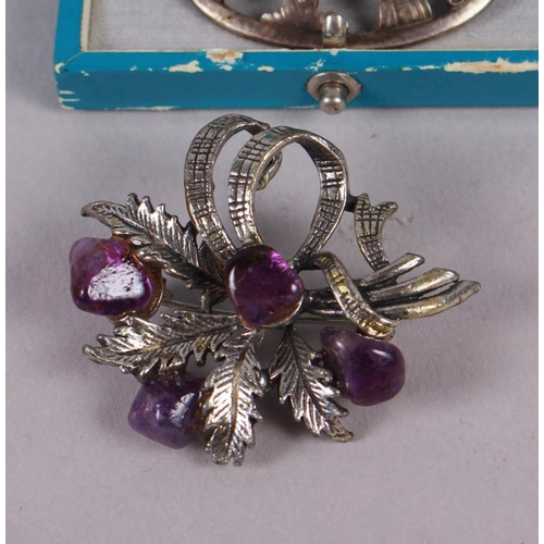 352 - A Georg Jensen silver brooch, No 283, decorated with a bird, in original box, a gold, diamond and am... 