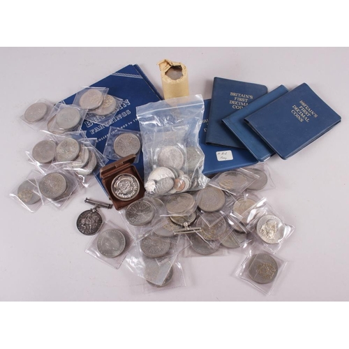 355 - A collection of British pre-decimal coinage, a WWI service medal to 181331 GNR A J Burt RA, and a WW... 