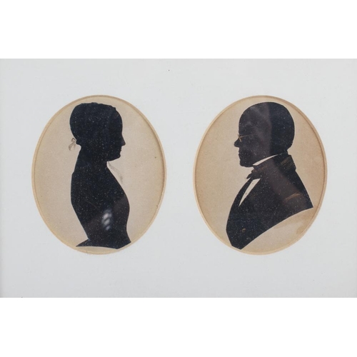 467 - An oval miniature portrait of a boy in a sailor suit and two pen and ink silhouette portraits of a l... 