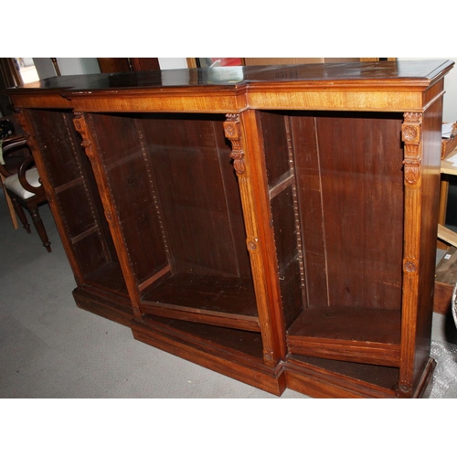 507 - A late 19th century walnut breakfront open bookcase with fluted pilasters and adjustable shelves, 72... 