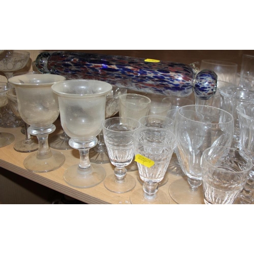 51 - A quantity of glassware, including six champagne flutes, brandy balloons, tumblers, jugs, a cake sta... 