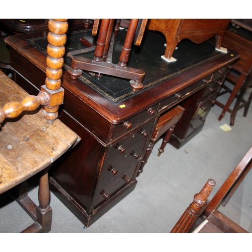 511 - A Victorian mahogany twin pedestal desk with green leather top, 54