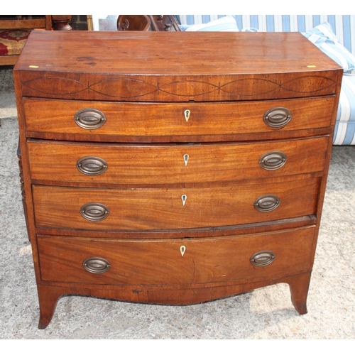 514 - A George III mahogany bowfront chest of four drawers, 36 1/2