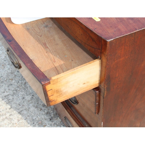 514 - A George III mahogany bowfront chest of four drawers, 36 1/2