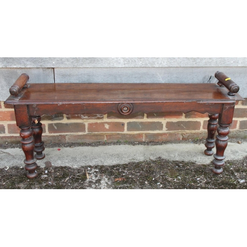 553 - A Victorian mahogany window seat, on turned supports, 42