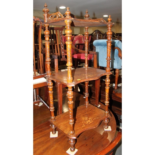 576 - A Victorian walnut three-tier whatnot inlaid vase design, 19