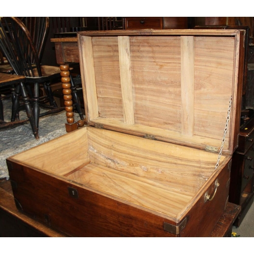 577 - A 19th century camphor wood trunk, inset brass corners and brackets, 32