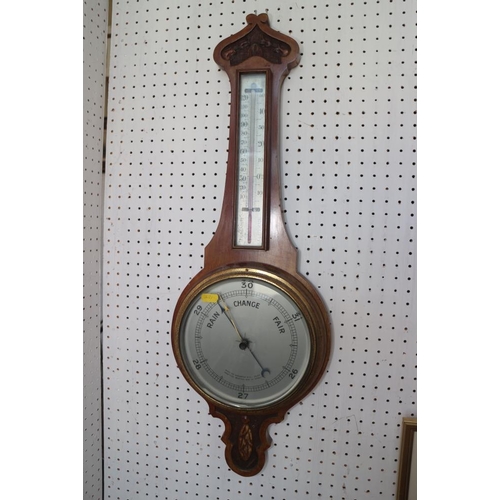 114 - A carved walnut banjo barometer and thermometer