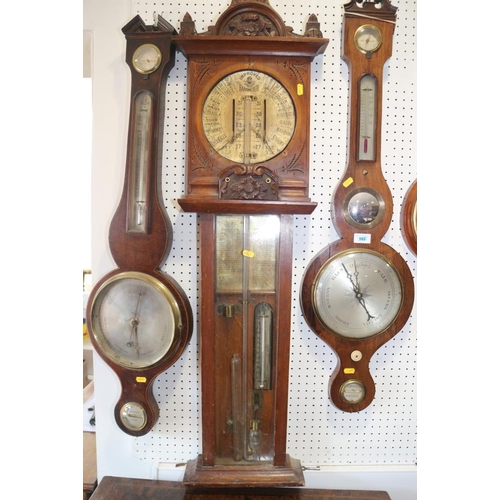 125 - An Admiral Fitzroy barometer, in carved wooden case, 44