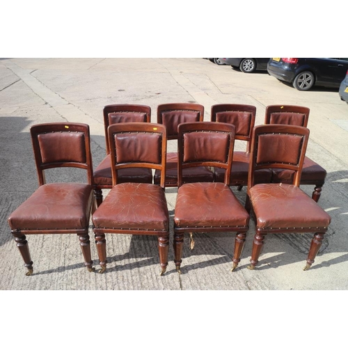 573 - A set of eight 19th century mahogany framed dining chairs with brown leather backs and seats, on tur... 