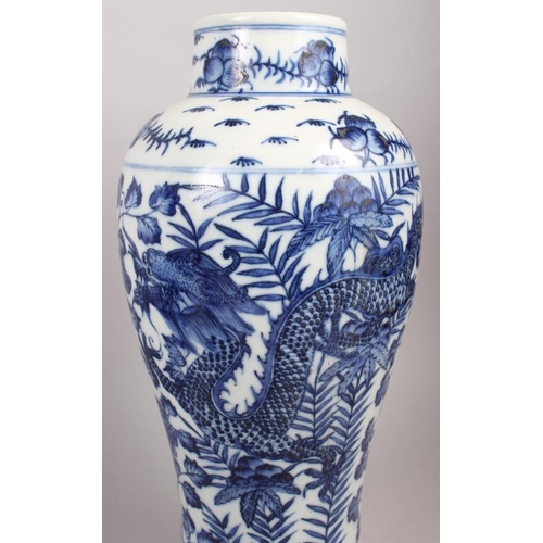 71 - A Chinese blue and white cylindrical vase with flared hip, decorated men carrying an urn, 12 1/4