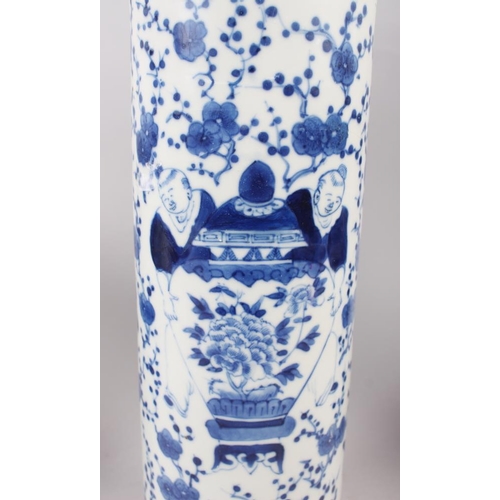 71 - A Chinese blue and white cylindrical vase with flared hip, decorated men carrying an urn, 12 1/4