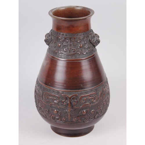 99 - A Chinese bronze vase of Archaic form, 10 1/4