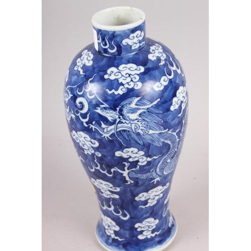 102 - A 19th century Chinese blue and white oviform vase, decorated dragons on a cloud ground with four ch... 