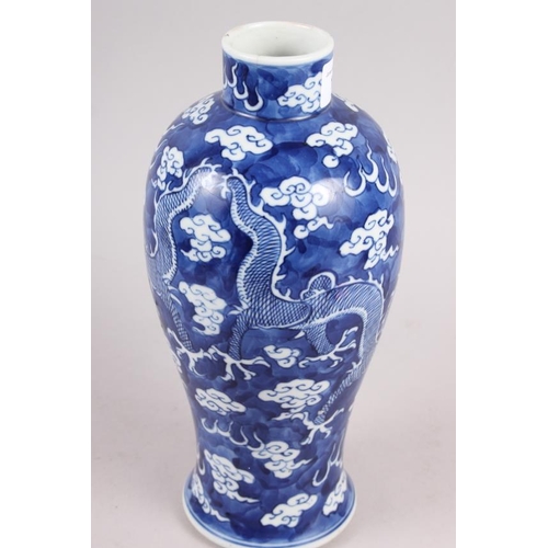 102 - A 19th century Chinese blue and white oviform vase, decorated dragons on a cloud ground with four ch... 