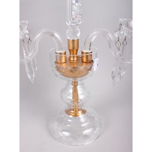 14 - A pair of two-branch glass candlesticks, hung drops with central spire finial, 15