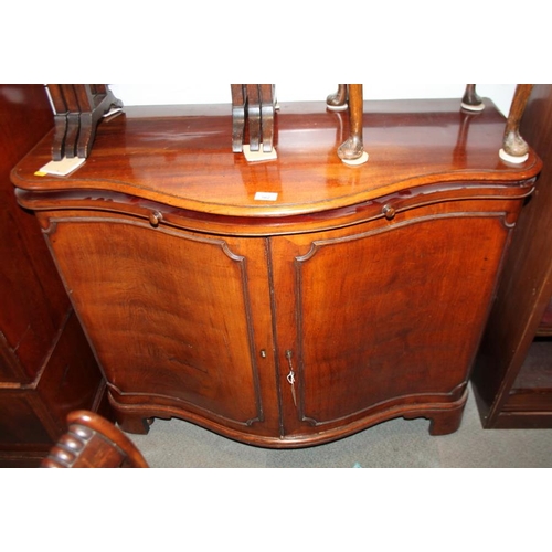 562 - A 19th century walnut side cabinet, fitted two doors with slide over, 42