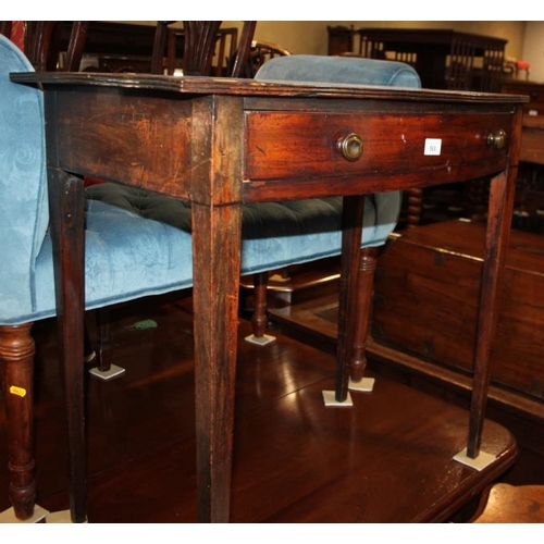 569 - A George III mahogany bowfront side table, on square taper supports, 30