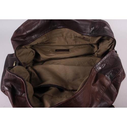 191 - A Rowallen brown leather holdall