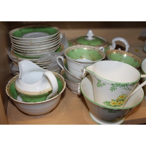 30 - A New Chelsea green floral part teaset and a Mortlock's green and gilt decorated part teaset