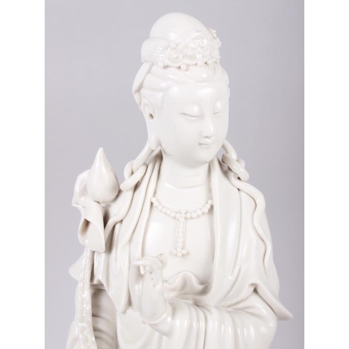 82 - A 20th century blanc de chine figure of Kuan Yin, 11