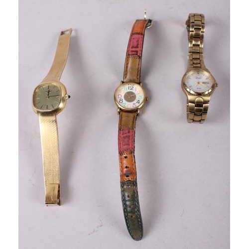 342 - A lady's Longines wristwatch, on flexible yellow metal bracelet, and two other wristwatches