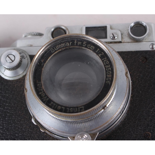 112 - A Leica D R P Rangefinder camera, No 234416, summar f=5cm 1:2 No 350906 lens, in leather case