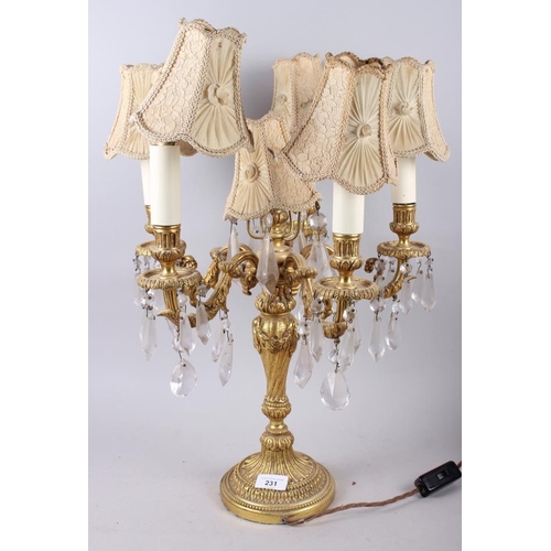 231 - A six-light gilt metal table lamp