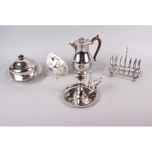 259 - A silver plated muffin dish, a toast rack, a chamber candlestick, etc