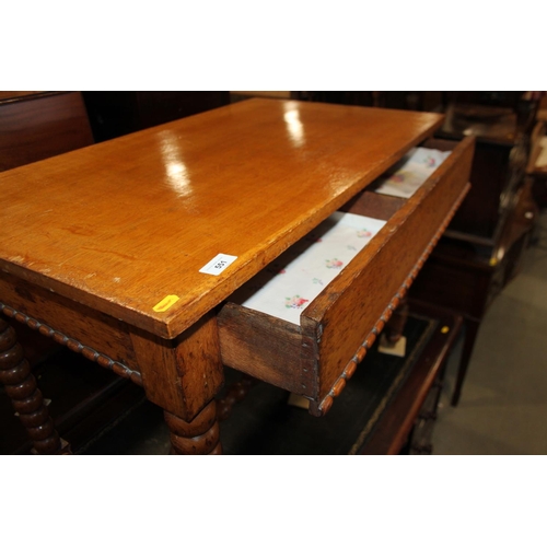 551 - A 19th century oak side table, fitted frieze drawer, on bobbin turned supports, 36