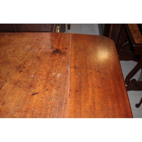 521 - A George III Cuban mahogany pad foot drop leaf table, 36