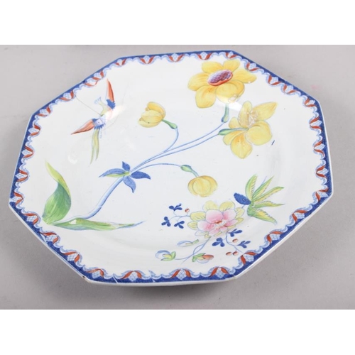 10 - A Rockingham china floral decorated and gilt plate, two Brameld blue and white floral decorated plat... 