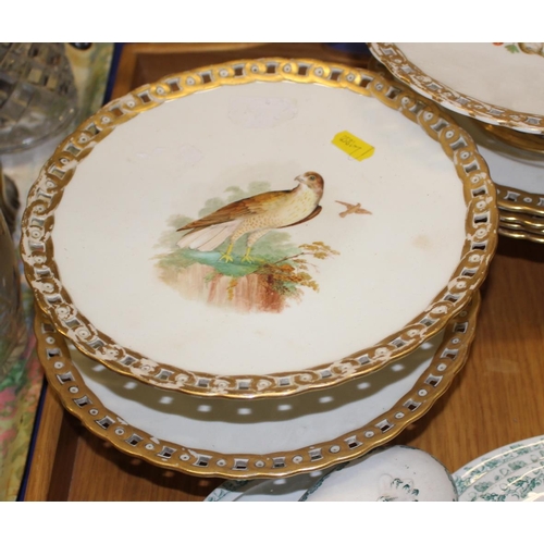 100 - Four 19th century hand-painted tazzas, decorated birds, three matching plates and a miniature dinner... 