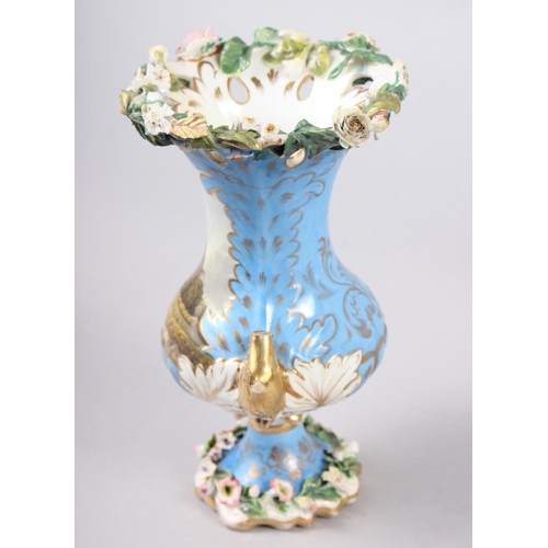 11 - A Rockingham pot pourri basket, a small Rockingham blue and gilt vase with gilt bird handles and han... 