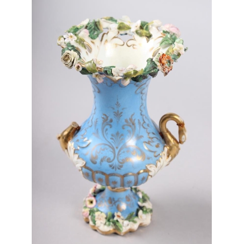 11 - A Rockingham pot pourri basket, a small Rockingham blue and gilt vase with gilt bird handles and han... 