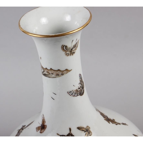 113 - A Chinese Republic bulbous vase with gilt butterfly decoration, 11 1/2