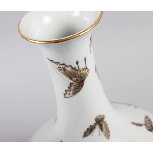 113 - A Chinese Republic bulbous vase with gilt butterfly decoration, 11 1/2