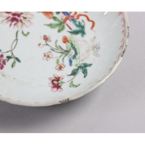 114 - A set of four Chinese tea bowls with floral and scroll decoration, and three matching dishes (chips ... 