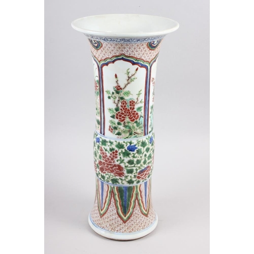 115 - A Chinese gu vase with panels decorated trees and flowers, 16 1/2