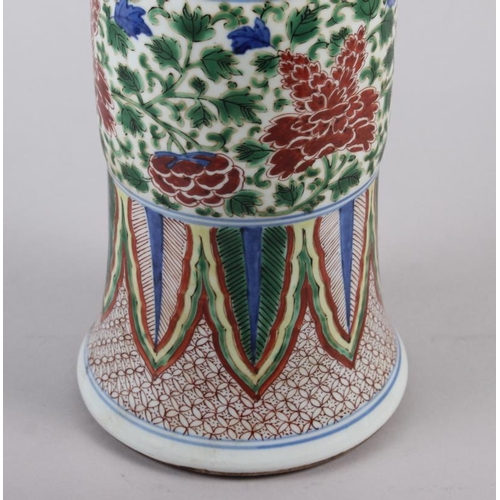 115 - A Chinese gu vase with panels decorated trees and flowers, 16 1/2