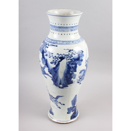 116 - A 19th century Chinese blue and white baluster vase, decorated warriors on horseback, 19 1/2