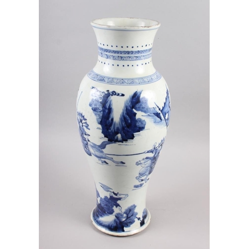 116 - A 19th century Chinese blue and white baluster vase, decorated warriors on horseback, 19 1/2