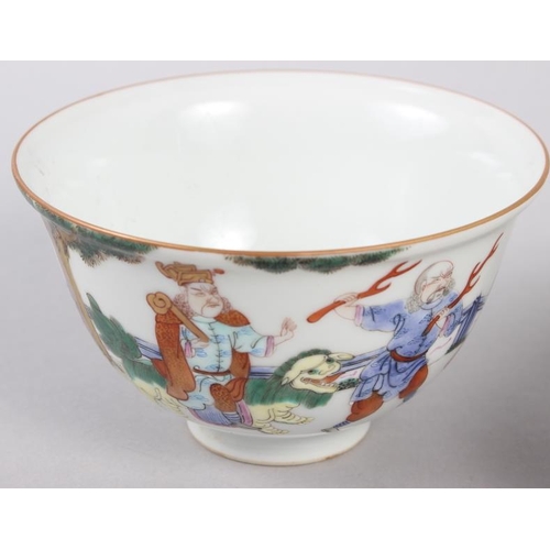 120 - A Chinese bowl with flared rim, decorated figures with elephants and lions, 2 1/2