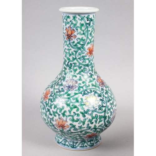 121 - A Chinese bulbous vase with vine and floral decoration, 8