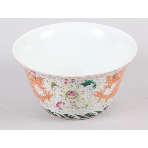 133 - A Chinese bowl with flared rim, decorated dragons and flowers with seal mark to base