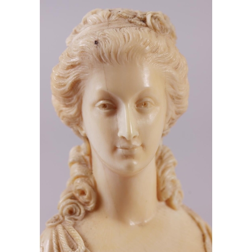 142 - A 19th century carved ivory portrait bust of Marie Antoinette, on turned column, 4 3/4