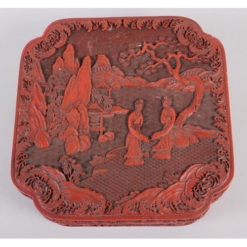 145 - A Chinese carved cinnabar lacquered box, decorated figures in a garden