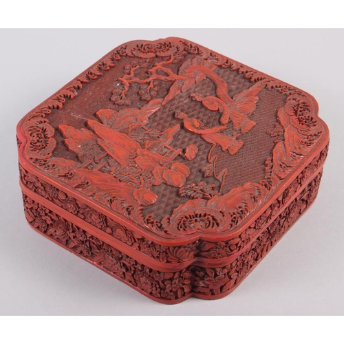 145 - A Chinese carved cinnabar lacquered box, decorated figures in a garden