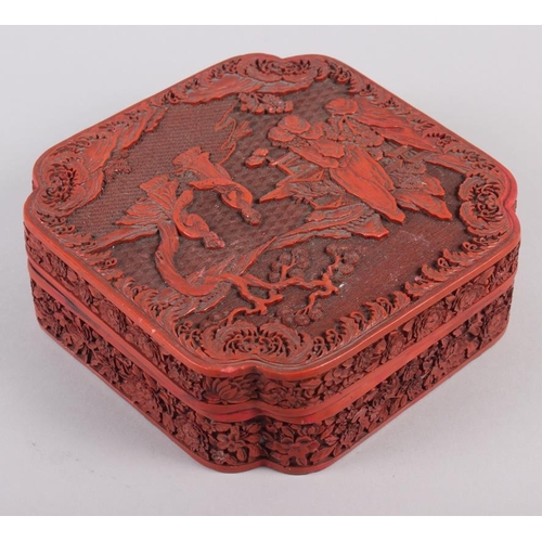 145 - A Chinese carved cinnabar lacquered box, decorated figures in a garden